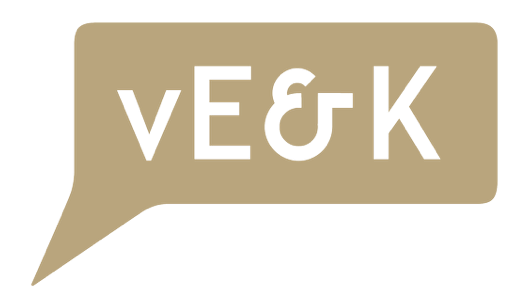 VEK.Logo.Farbe_B9A57D_Pfeil Links unten